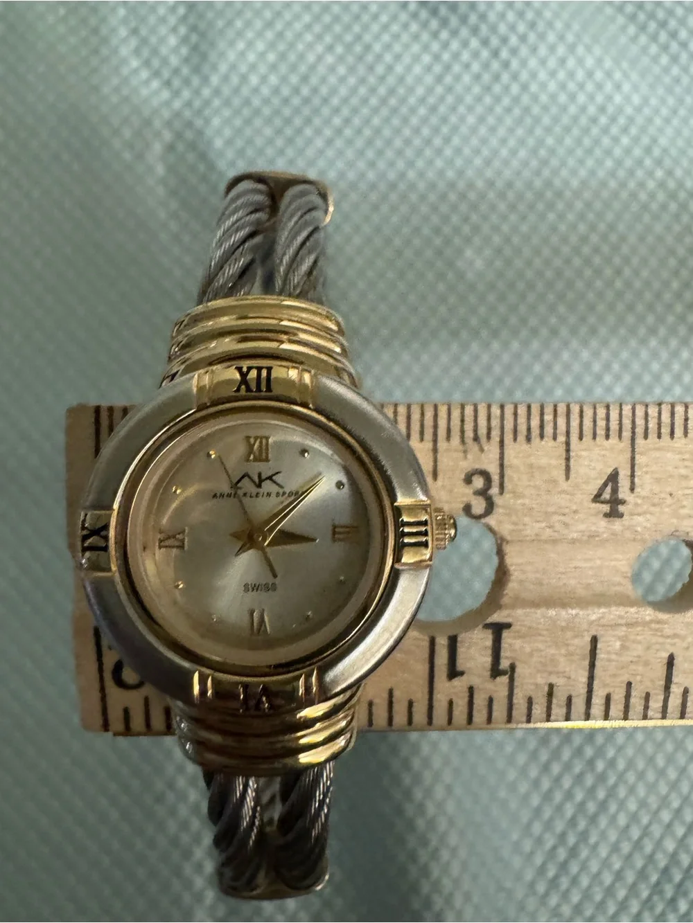 Anne Klein Two-Tone Gold and Silver Cable Bracelet Watch